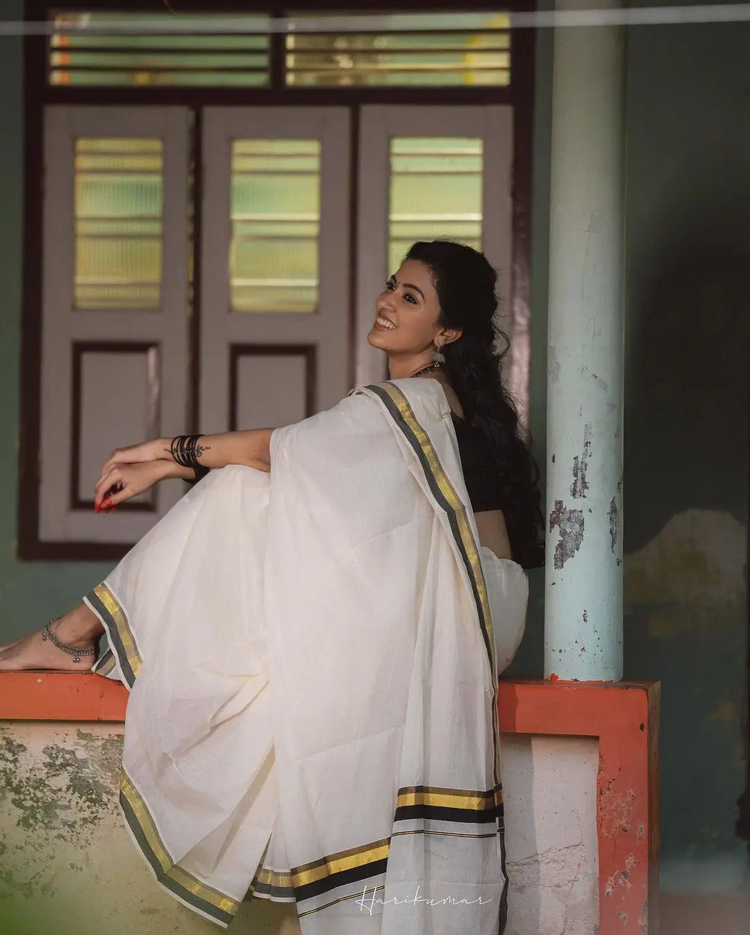 Malayalam Actress Anju Kurian Stills in White Saree Black Blouse